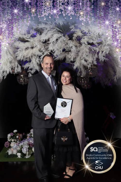 Matthew and Lisa accepting the Essay Award